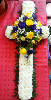 rose-lisianthus-funeral-cross-Funeral cross with yellow roses and purple lisianthus_funeral flowers The Little Flower Shop Florist.jpg TFS-min-min
